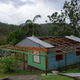 A man surveys damaged property in the Carbonera community of Guantanamo, Cuba following Hurricane Matthew, October 5, 2016. The storm slammed into Haiti and Cuba as a Category Four hurricane on October 4, 2016 but has since been downgraded to three, on a scale of five, by the US National Hurricane Center (NHC). Its winds were howling at 115 miles per hour. (Image: Getty)